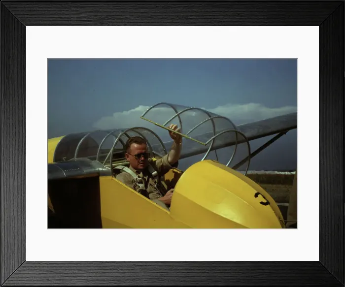 Framed Print : Marine glider pilot in training at Page Field, is watching take-offs, Parris Island, S. C. 1942. Creator: Alfred T Palmer Framed Print : Marine glider pilot in training at Page Field, is watching take-offs, Parris Island, S. C. 1942. Creator: Alfred T Palmer