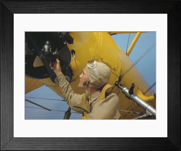 Framed Print : Marine lieutenant by the power towing plane for the gliders at Parris Island, S. C. 1942. Creator: Alfred T Palmer Framed Print : Marine lieutenant by the power towing plane for the gliders at Parris Island, S. C. 1942. Creator: Alfred T Palmer