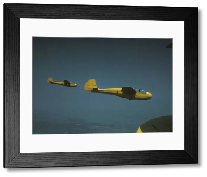 Framed Print : Marine gliders being towed from Page Field, Parris Island, S. C. 1942. Creator: Alfred T Palmer Framed Print : Marine gliders being towed from Page Field, Parris Island, S. C. 1942. Creator: Alfred T Palmer