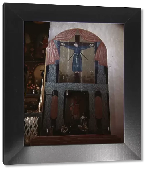 Side altar in the church dedicated to San Lorenzo and San Felipe de Jesus, Trampas, New Mexico, 1943 Creator: John Collier