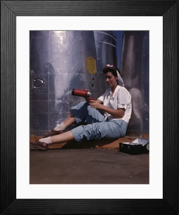 Framed Print : Girl worker at lunch also absorbing Calif... Douglas Aircraft Company, Long Beach, Calif. 1942. Creator: Alfred T Palmer Framed Print : Girl worker at lunch also absorbing Calif... Douglas Aircraft Company, Long Beach, Calif. 1942. Creator: Alfred T Palmer