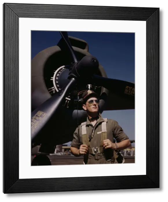 Framed Print : Lieutenant Mike'Hunter, Army pilot assigned to Douglas Aircraft Company, Long Beach, Calif. 1942. Creator: Alfred T Palmer Framed Print : Lieutenant Mike'Hunter, Army pilot assigned to Douglas Aircraft Company, Long Beach, Calif. 1942. Creator: Alfred T Palmer