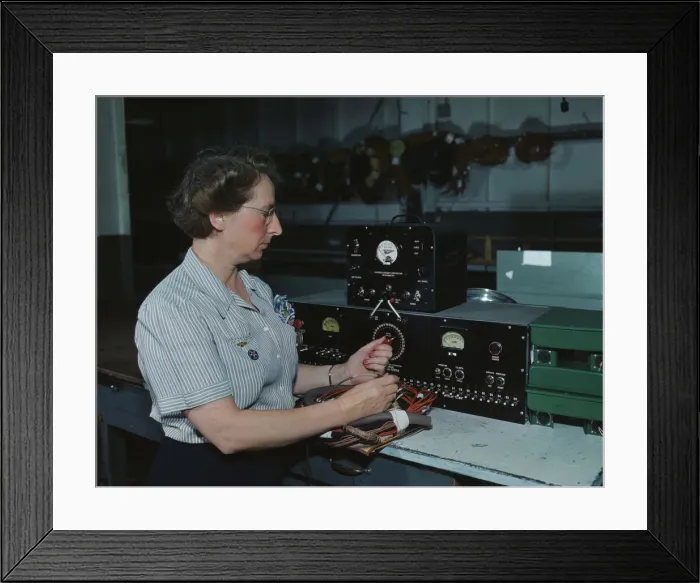 Framed Print : Working with the electric wiring at Douglas Aircraft Company, Long Beach, Calif. 1942. Creator: Alfred T Palmer Framed Print : Working with the electric wiring at Douglas Aircraft Company, Long Beach, Calif. 1942. Creator: Alfred T Palmer