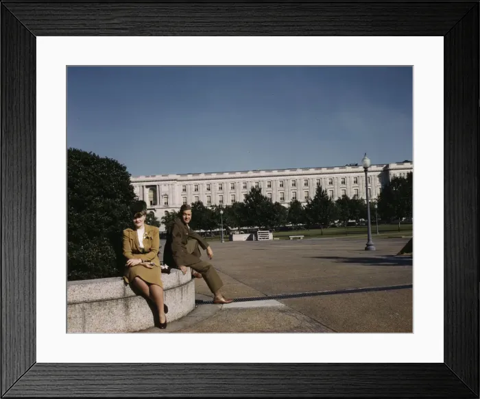 Framed Print : A soldier and a woman in a park, with the Old Russell Senate Office... Washington, D.C. ca. 1943. Creator: Unknown Framed Print : A soldier and a woman in a park, with the Old Russell Senate Office... Washington, D.C. ca. 1943. Creator: Unknown