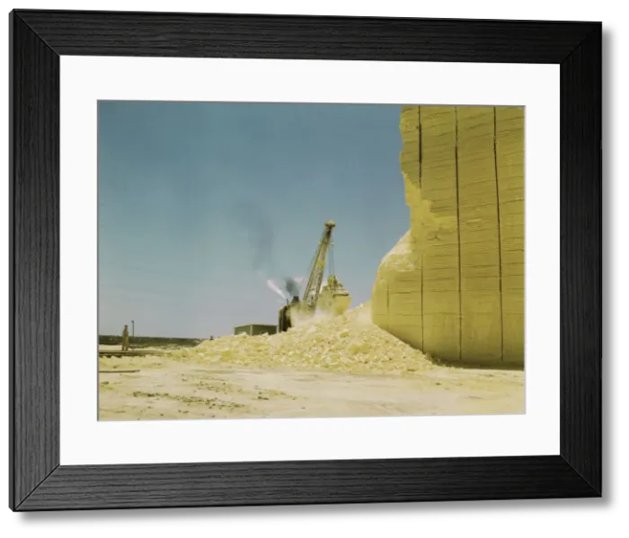 Framed Print : Loading sulphur from vat, Freeport Sulphur Co. Hoskins Mound, Texas, 1943. Creator: John Vachon Framed Print : Loading sulphur from vat, Freeport Sulphur Co. Hoskins Mound, Texas, 1943. Creator: John Vachon