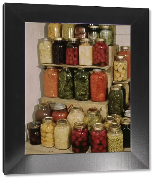 Display of home-canned food, between 1941 and 1945. Creator: Unknown