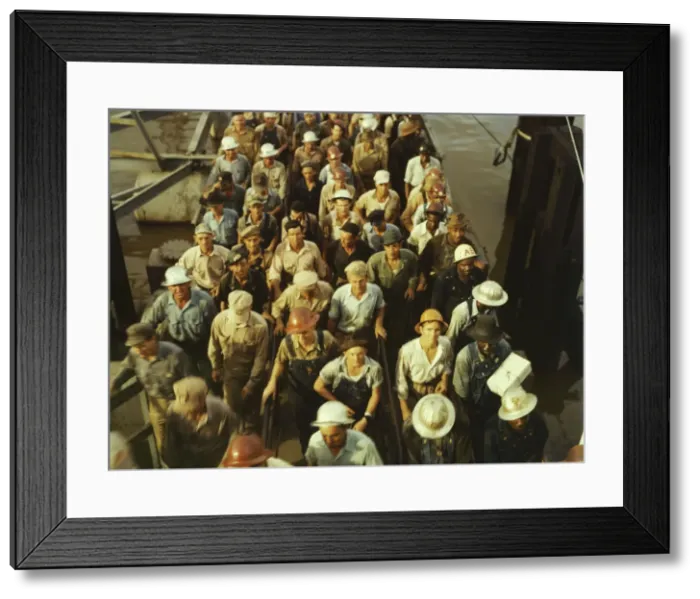Framed Print : Workers leaving Pennsylvania shipyards, Beaumont, Texas, 1943. Creator: John Vachon Framed Print : Workers leaving Pennsylvania shipyards, Beaumont, Texas, 1943. Creator: John Vachon