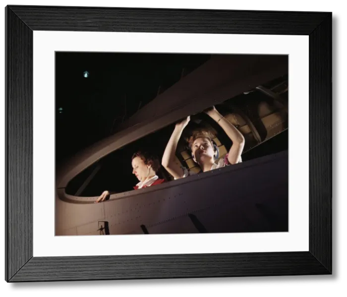 Framed Print : American mothers and sisters, like these women at the Douglas Aircraft... Long Beach, Calif. 1942 Creator: Alfred T Palmer Framed Print : American mothers and sisters, like these women at the Douglas Aircraft... Long Beach, Calif. 1942 Creator: Alfred T Palmer