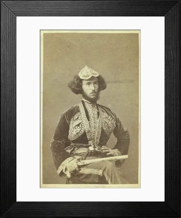Framed Print : Three-quarter portrait of man, seated, facing right, between 1870 and 1886. Creator: Unknown