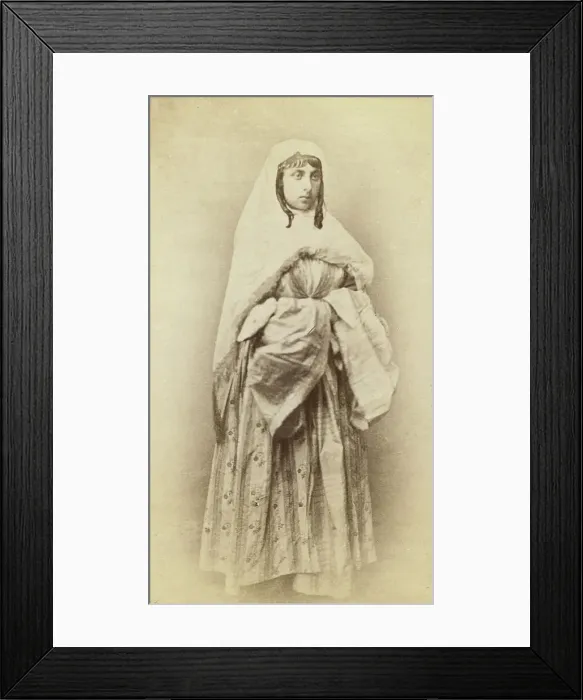 Framed Print : Full-length portrait of a woman, facing slightly right, in traditional dress, between 1870 and 1886. Creator: Unknown Framed Print : Full-length portrait of a woman, facing slightly right, in traditional dress, between 1870 and 1886. Creator: Unknown