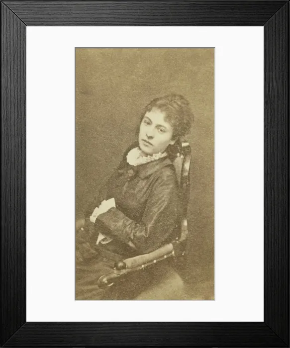 Framed Print : Three-quarter length portrait of woman, seated in chair, facing left, between 1880 and 1886. Creator: Unknown Framed Print : Three-quarter length portrait of woman, seated in chair, facing left, between 1880 and 1886. Creator: Unknown
