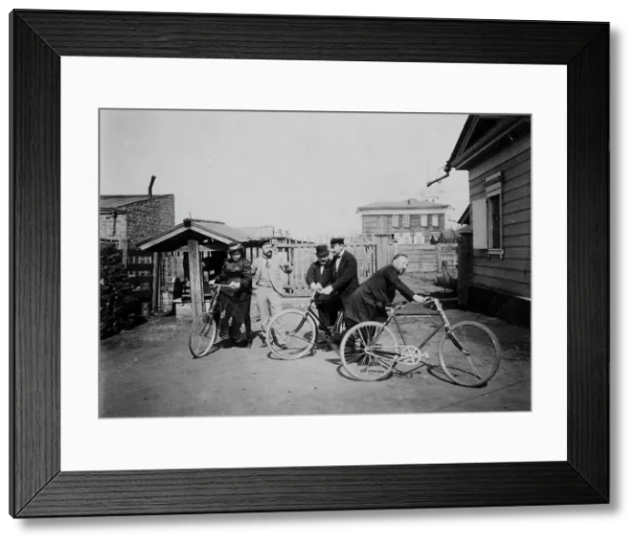 Framed Print : Cyclists in the courtyard of the estate, 1900. Creators: V. I. Podgorbunskii, I. A. Podgorbunskii Framed Print : Cyclists in the courtyard of the estate, 1900. Creators: V. I. Podgorbunskii, I. A. Podgorbunskii