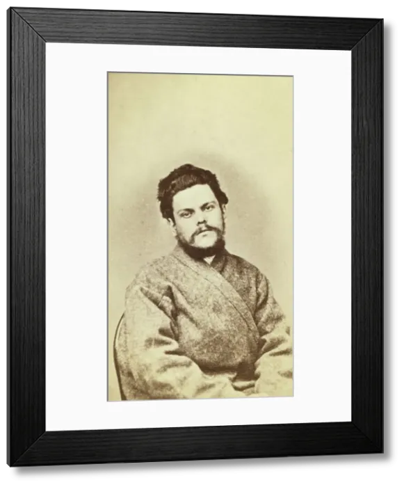 Framed Print : Half-length portrait of a man, dressed in convict clothing, facing front, between 1880 and 1886. Creator: Unknown Framed Print : Half-length portrait of a man, dressed in convict clothing, facing front, between 1880 and 1886. Creator: Unknown
