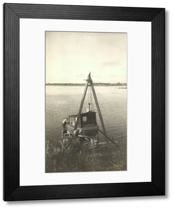 Framed Print : Repair of the boat Mana on the banks of the Zeya River, 1909. Creator: Vladimir Ivanovich Fedorov. Repair of the boat Mana on the banks of the Zeya River, 1909. Creator: Vladimir Ivanovich Fedorov Framed Print : Repair of the boat Mana on the banks of the Zeya River, 1909. Creator: Vladimir Ivanovich Fedorov. Repair of the boat Mana on the banks of the Zeya River, 1909. Creator: Vladimir Ivanovich Fedorov