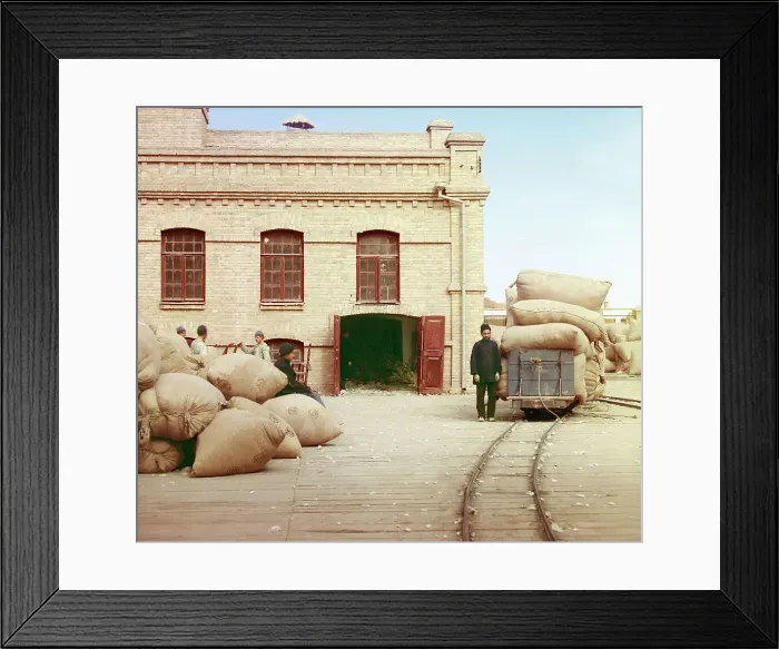 Framed Print : Labourers loading sacks onto railway at factory warehouse, between 1905 and 1915. Creator: Sergey Mikhaylovich Prokudin-Gorsky Framed Print : Labourers loading sacks onto railway at factory warehouse, between 1905 and 1915. Creator: Sergey Mikhaylovich Prokudin-Gorsky