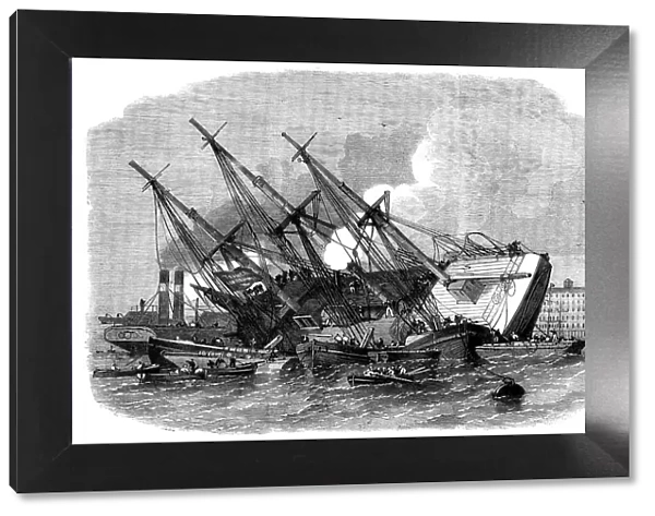 Raising the iron ship Ganges, sunk in the Thames off Shadwell, 1862. Creator: Unknown