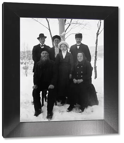 Brus Lars Larsson (b.1854) with wife Sara and children Lorentz and Märta and family... 1916. Creator: Leonard Hansson