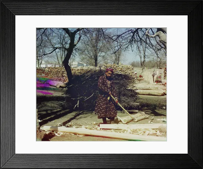 Framed Print : Man using tool to strip logs, Central Asia?, between 1905 and 1915. Creator: Sergey Mikhaylovich Prokudin-Gorsky Framed Print : Man using tool to strip logs, Central Asia?, between 1905 and 1915. Creator: Sergey Mikhaylovich Prokudin-Gorsky