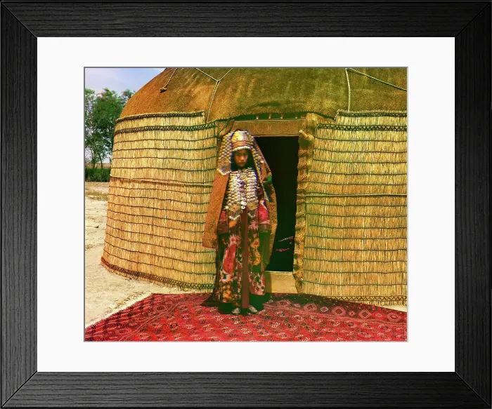 Framed Print : Woman in traditional dress and jewelry standing on rug in front of yurt, between 1905 and 1915. Creator: Sergey Mikhaylovich Prokudin-Gorsky Framed Print : Woman in traditional dress and jewelry standing on rug in front of yurt, between 1905 and 1915. Creator: Sergey Mikhaylovich Prokudin-Gorsky