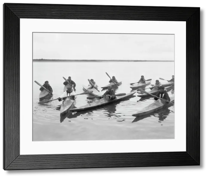 Framed Print : Eskimos in kayaks, Noatak, Alaska, c1929. Creator: Edward Sheriff Curtis