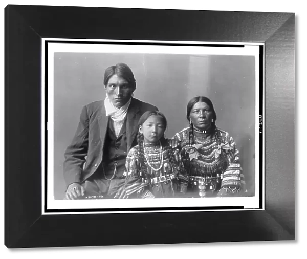 Reuben Black Boy and family, c1910. Creator: Edward Sheriff Curtis