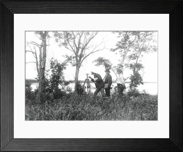 Framed Print : Prospectors conducting a triangulation survey from the bank of the Zeya River, 1909. Creator: Unknown Framed Print : Prospectors conducting a triangulation survey from the bank of the Zeya River, 1909. Creator: Unknown