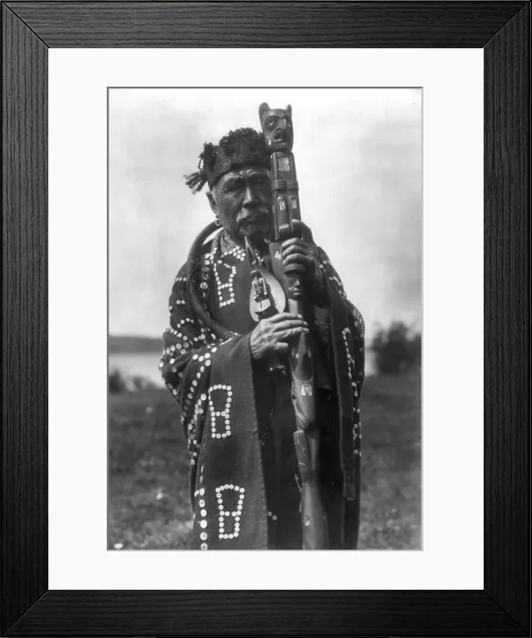 Framed Print : Hamasaka in Tluwulahu costume with speaker's staff-Qagyuhl [principal chief], c1914. Creator: Edward Sheriff Curtis