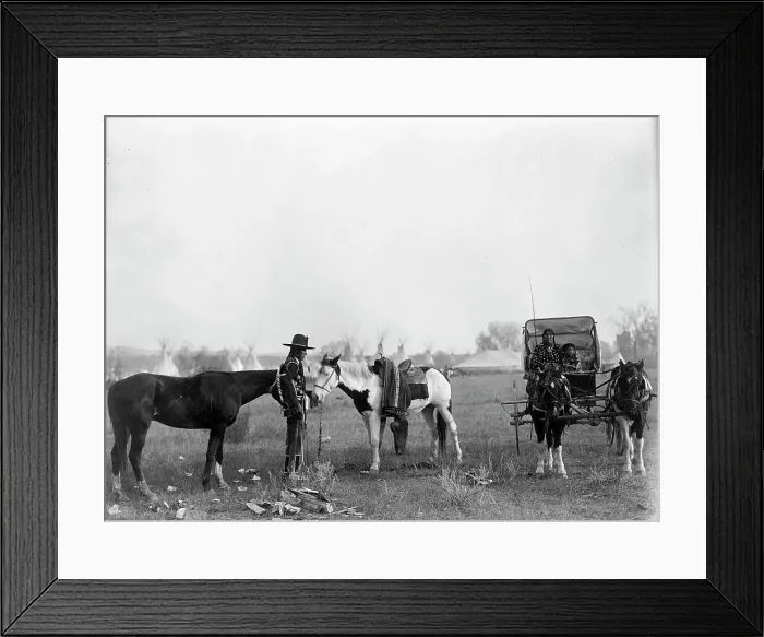 Framed Print : High Medicine Rock, Crow Indian with two horses at left, Her Horse Kills with child in... c1908. Creator: Edward Sheriff Curtis Framed Print : High Medicine Rock, Crow Indian with two horses at left, Her Horse Kills with child in... c1908. Creator: Edward Sheriff Curtis
