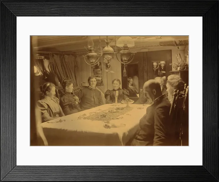 Framed Print : Captains, their wives, and two female tourists sitting around a table aboard ship...Alaska, (1897?) Creator: Alfred Lee Broadbent Framed Print : Captains, their wives, and two female tourists sitting around a table aboard ship...Alaska, (1897?) Creator: Alfred Lee Broadbent