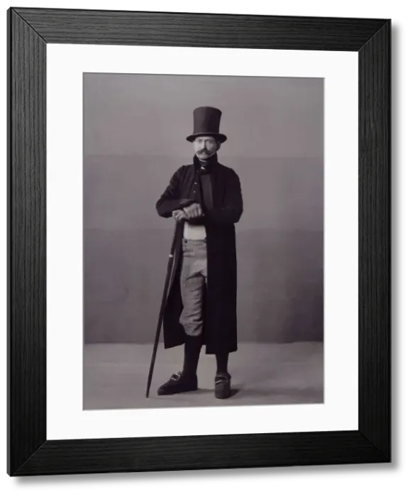 Framed Print : A man poses in folk costume with a long coat and a top hat, 1880-1907. Creator: Helene Edlund Framed Print : A man poses in folk costume with a long coat and a top hat, 1880-1907. Creator: Helene Edlund