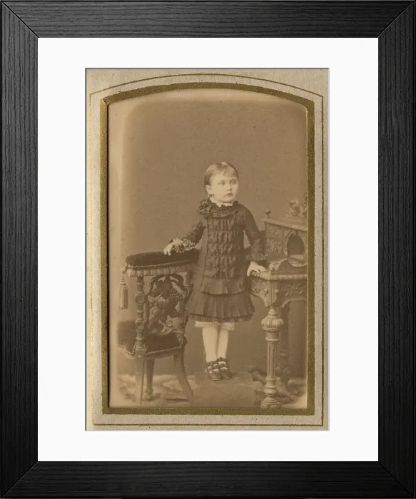 Framed Print : A girl in a dress and shoes, late 19th cent - early 20th cent. Creator: PA Milevskii Framed Print : A girl in a dress and shoes, late 19th cent - early 20th cent. Creator: PA Milevskii