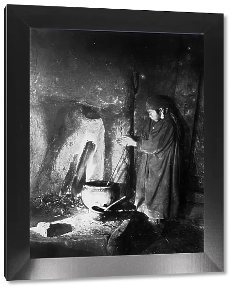 Girl at the hearth, late 19th cent - early 20th cent. Creator: I Popov