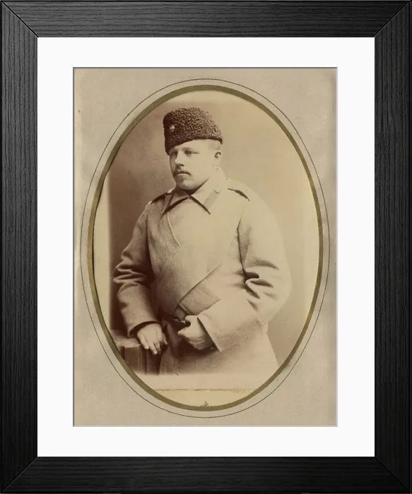 Framed Print : A young man in a fireman's uniform (overcoat and hat), late 19th cent - early 20th cent Creator: Shnee Framed Print : A young man in a fireman's uniform (overcoat and hat), late 19th cent - early 20th cent Creator: Shnee