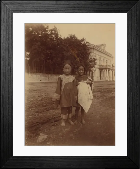 Framed Print : Two barefoot children standing in muddy street in front of the Lindholm's large... (1899?). Creator: Eleanor Lord Pray Framed Print : Two barefoot children standing in muddy street in front of the Lindholm's large... (1899?). Creator: Eleanor Lord Pray