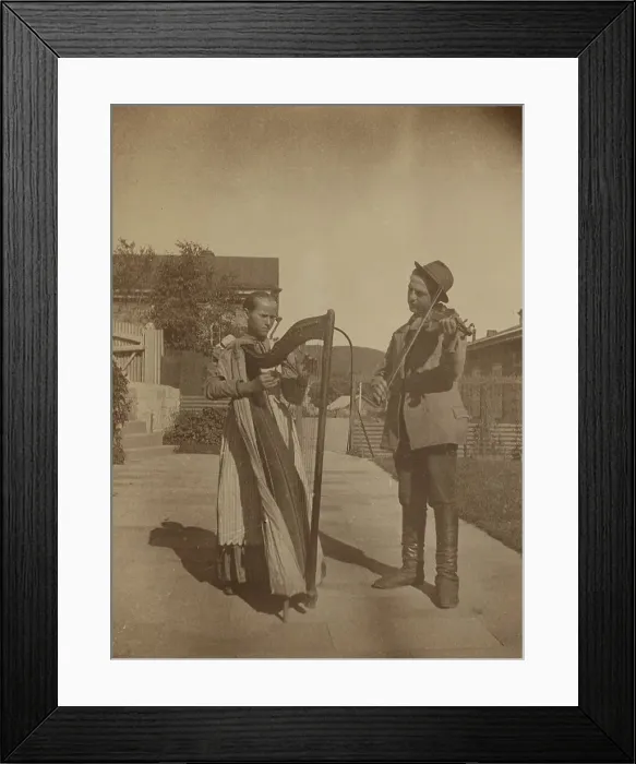 Framed Print : Street musicians with a harp and violin in the upper yard of Dom Smith, Vladivostok, Russia, (1899?) Creator: Eleanor Lord Pray Framed Print : Street musicians with a harp and violin in the upper yard of Dom Smith, Vladivostok, Russia, (1899?) Creator: Eleanor Lord Pray