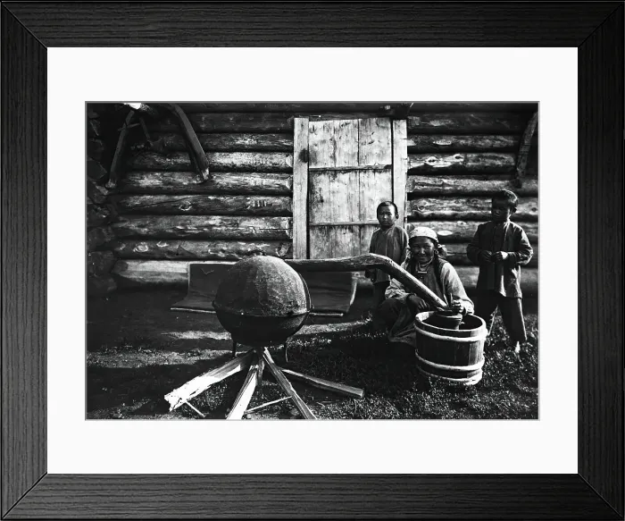 Framed Print : Woman preparing tarasun, 1890. Creator: Unknown Framed Print : Woman preparing tarasun, 1890. Creator: Unknown
