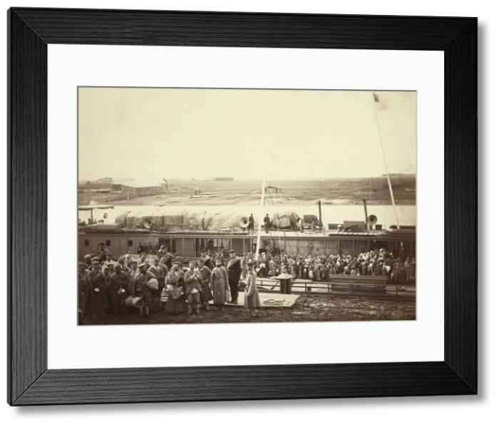 Framed Print : Party of exiles and convicts embarking on river barge at Tumen [ie, Tiumen]... between 1885 and 86. Creator: Unknown