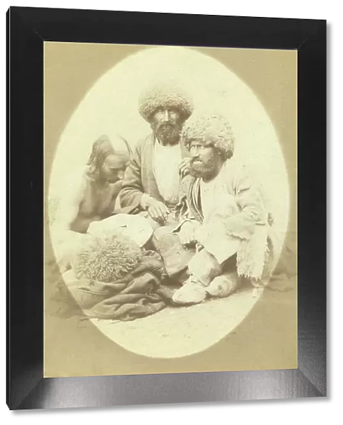 Full-length portrait of three men, seated on ground, facing front, between 1870 and 1886. Creator: Unknown