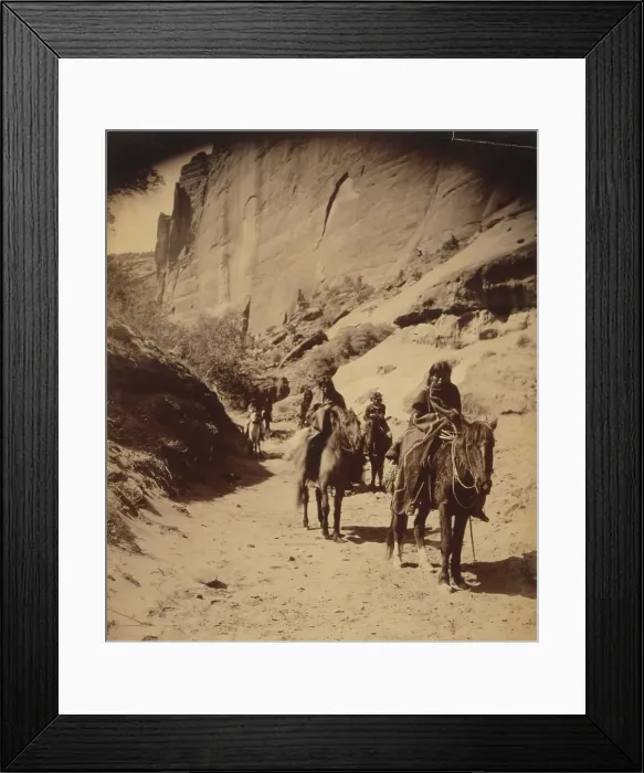 Framed Print : Band of mounted Navahos passing through Cañon, c1904. Creator: Edward Sheriff Curtis Framed Print : Band of mounted Navahos passing through Cañon, c1904. Creator: Edward Sheriff Curtis