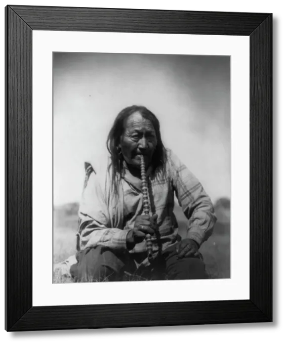 Framed Print : Arapaho Indian smoking pipe, c1910. Creator: Edward Sheriff Curtis Framed Print : Arapaho Indian smoking pipe, c1910. Creator: Edward Sheriff Curtis