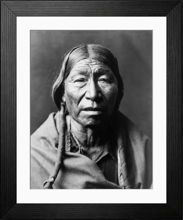 Framed Print : Cheyenne male, facing front, hair in wrapped braids, blanket around shoulders, c1910. Creator: Edward Sheriff Curtis Framed Print : Cheyenne male, facing front, hair in wrapped braids, blanket around shoulders, c1910. Creator: Edward Sheriff Curtis