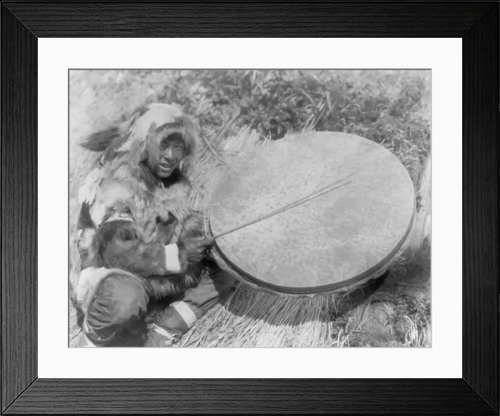 Framed Print : The drummer-Nunivak, c1929. Creator: Edward Sheriff Curtis Framed Print : The drummer-Nunivak, c1929. Creator: Edward Sheriff Curtis