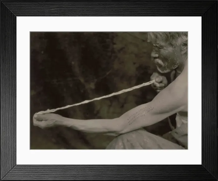 Framed Print : Measuring shell money-Tolowa, c1923. Creator: Edward Sheriff Curtis Framed Print : Measuring shell money-Tolowa, c1923. Creator: Edward Sheriff Curtis