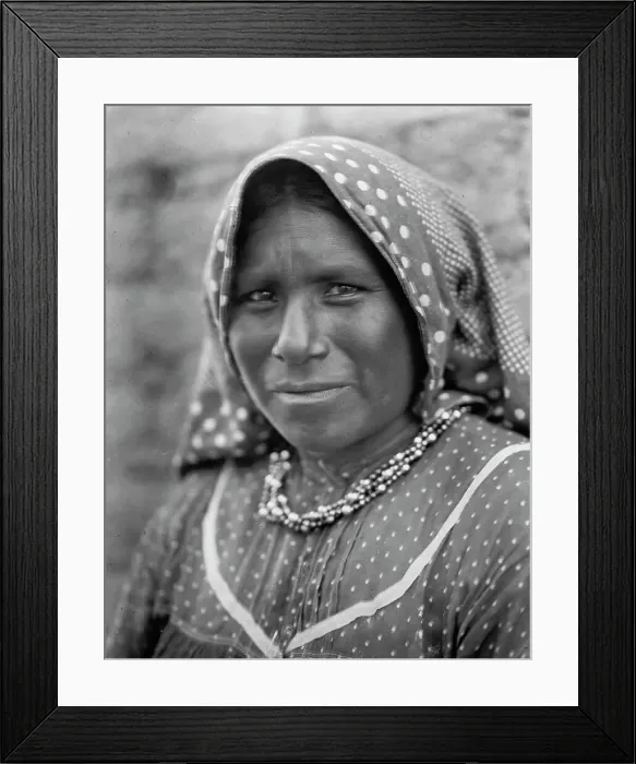 Framed Print : Yaqui matron, head-and-shoulders portrait, facing slightly left, wearing printed cotton... c1907. Creator: Edward Sheriff Curtis