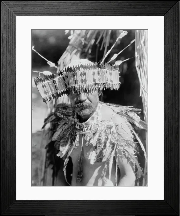 Framed Print : Man in Pomo dance costume, half-length portrait, facing front, c1924. Creator: Edward Sheriff Curtis Framed Print : Man in Pomo dance costume, half-length portrait, facing front, c1924. Creator: Edward Sheriff Curtis