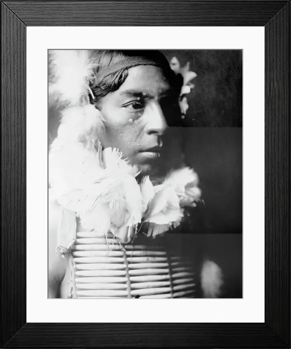 Framed Print : The Dancer, Crow Indian, head-and-shoulders portrait, facing right, c1905. Creator: Edward Sheriff Curtis Framed Print : The Dancer, Crow Indian, head-and-shoulders portrait, facing right, c1905. Creator: Edward Sheriff Curtis