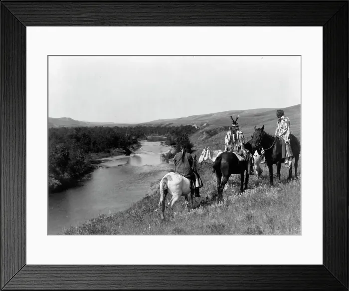 Framed Print : Three Piegan Indians and four horses on hill above river, c1910. Creator: Edward Sheriff Curtis Framed Print : Three Piegan Indians and four horses on hill above river, c1910. Creator: Edward Sheriff Curtis