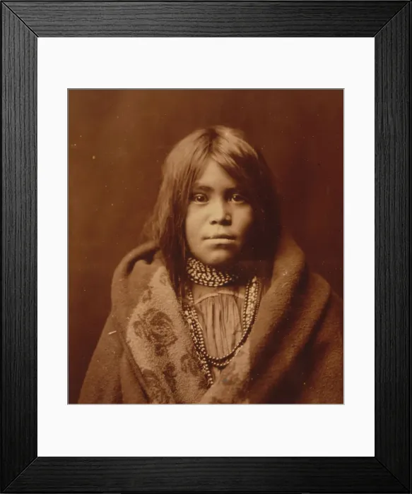Framed Print : An Apache girl, head-and-shoulders portrait, facing front, wearing bead necklace... c1903. Creator: Edward Sheriff Curtis Framed Print : An Apache girl, head-and-shoulders portrait, facing front, wearing bead necklace... c1903. Creator: Edward Sheriff Curtis