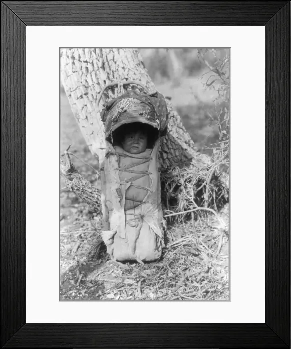 Framed Print : Apache babe in carrier, c1903. Creator: Edward Sheriff Curtis Framed Print : Apache babe in carrier, c1903. Creator: Edward Sheriff Curtis