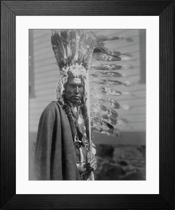 Framed Print : Piegan war-bonnet and coup-stick, c1910. Creator: Edward Sheriff Curtis Framed Print : Piegan war-bonnet and coup-stick, c1910. Creator: Edward Sheriff Curtis